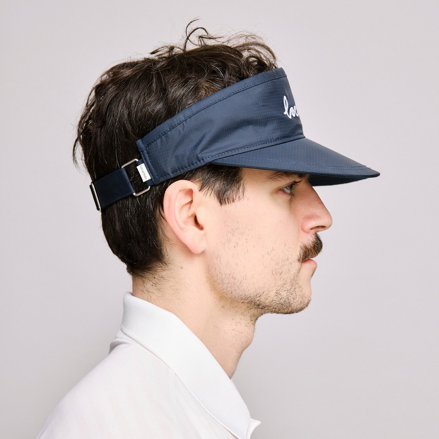 Visor Italic Logo Blå Local Rule