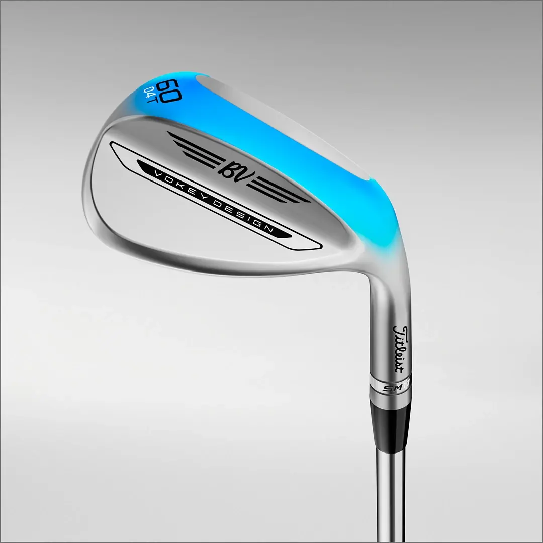 Golfklubba, Titleist Vokey Design wedge med blå markering, 60 graders loft och texten "VOKEY DESIGN" på klubbhuvudet.